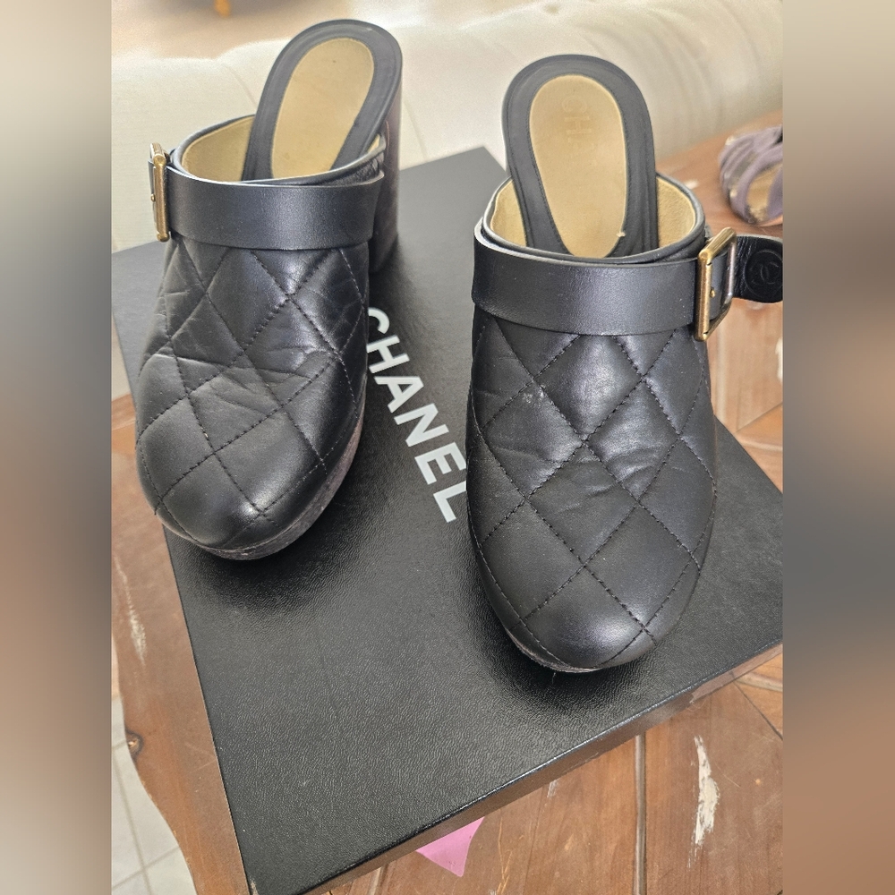 CHANEL Black Quilted Mules with Gold Buckle